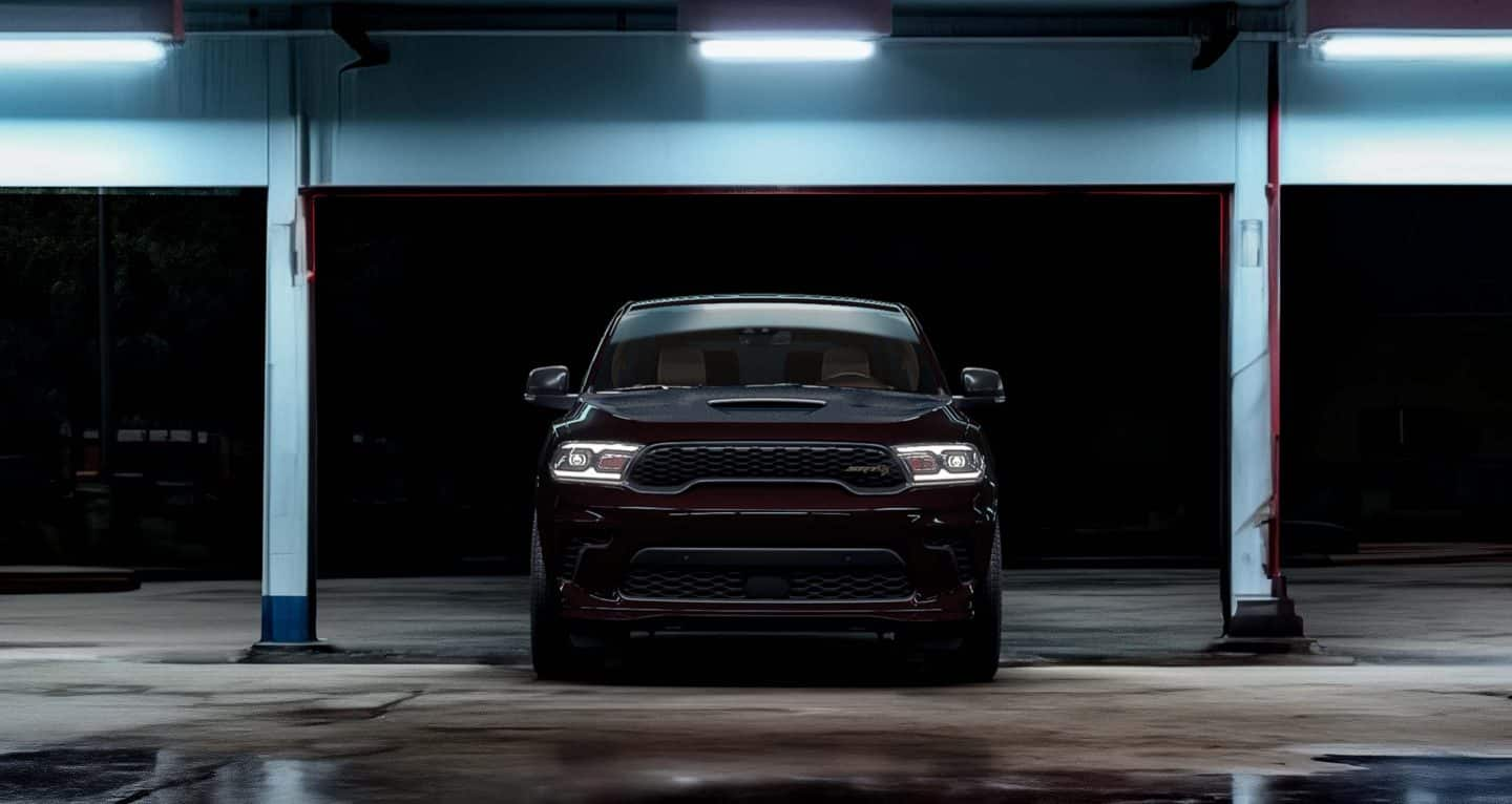 Display The front end of a dark 2025 Dodge Durango SRT Hellcat Hammerhead Special Edition.