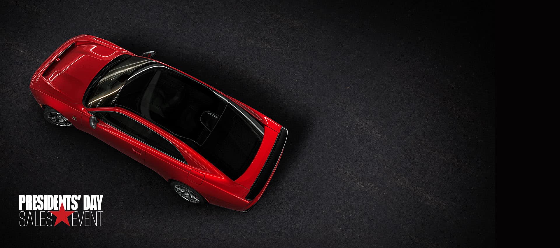 An overhead angle of a red 2024 Dodge Next-Gen Charger Scat Pack highlighting its panoramic glass sunroof. Presidents' Day Sales Event.