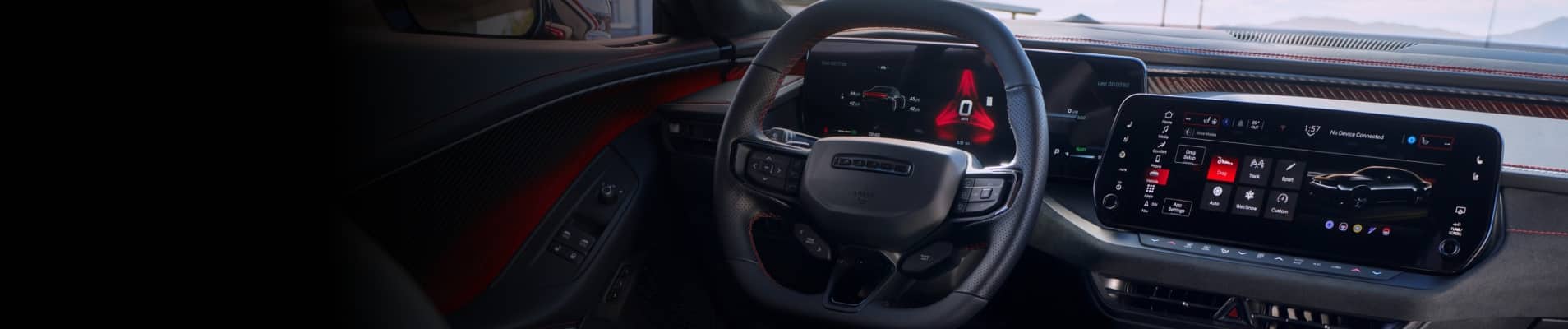 The steering wheel, Digital Cluster Display and Uconnect touchscreen in the 2026 Dodge Charger, with the touchscreen displaying a Dodge Performance Page.